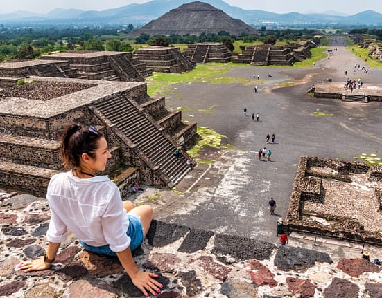 Tourism in Mexico City - young adult visits ancient Teotihuacan pyramids